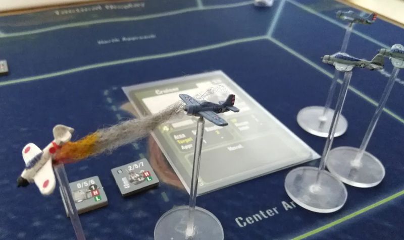 A photograph of Corsair Leader, with miniature aircraft flying about going pew pew