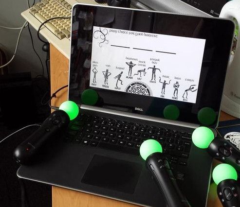 Laptop with Sacred Harvest, and PS Move controllers